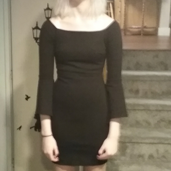 A black off the shoulder, strapless dress - Picture 1 of 4